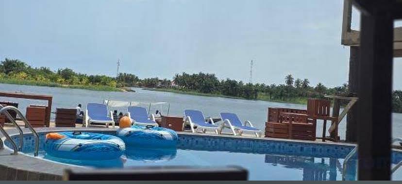 Poolside loungers overlooking the Volta estuary