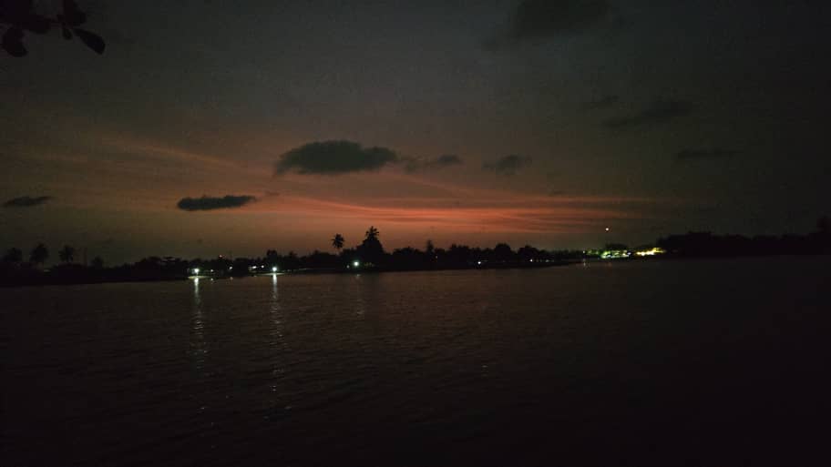 A boat on the Volta at sunset